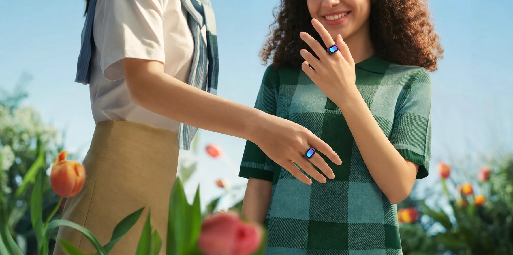 Two people wearing Soliman Ring while spending time together in a spring garden